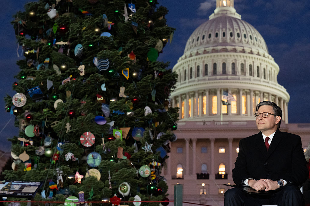 US Speaker of the House Mike Johnson, Republican from Louisiana, attends the US Capitol Christmas Tree Lighting Ceremony on Capitol Hill in Washington, DC, December 2, 2025. The 53-foot red fir tree is from the Humboldt-Toiyabe National Forest in Nevada, the first time the state has provided the US Capitol Christmas Tree. (Photo by SAUL LOEB / AFP via Getty Images)