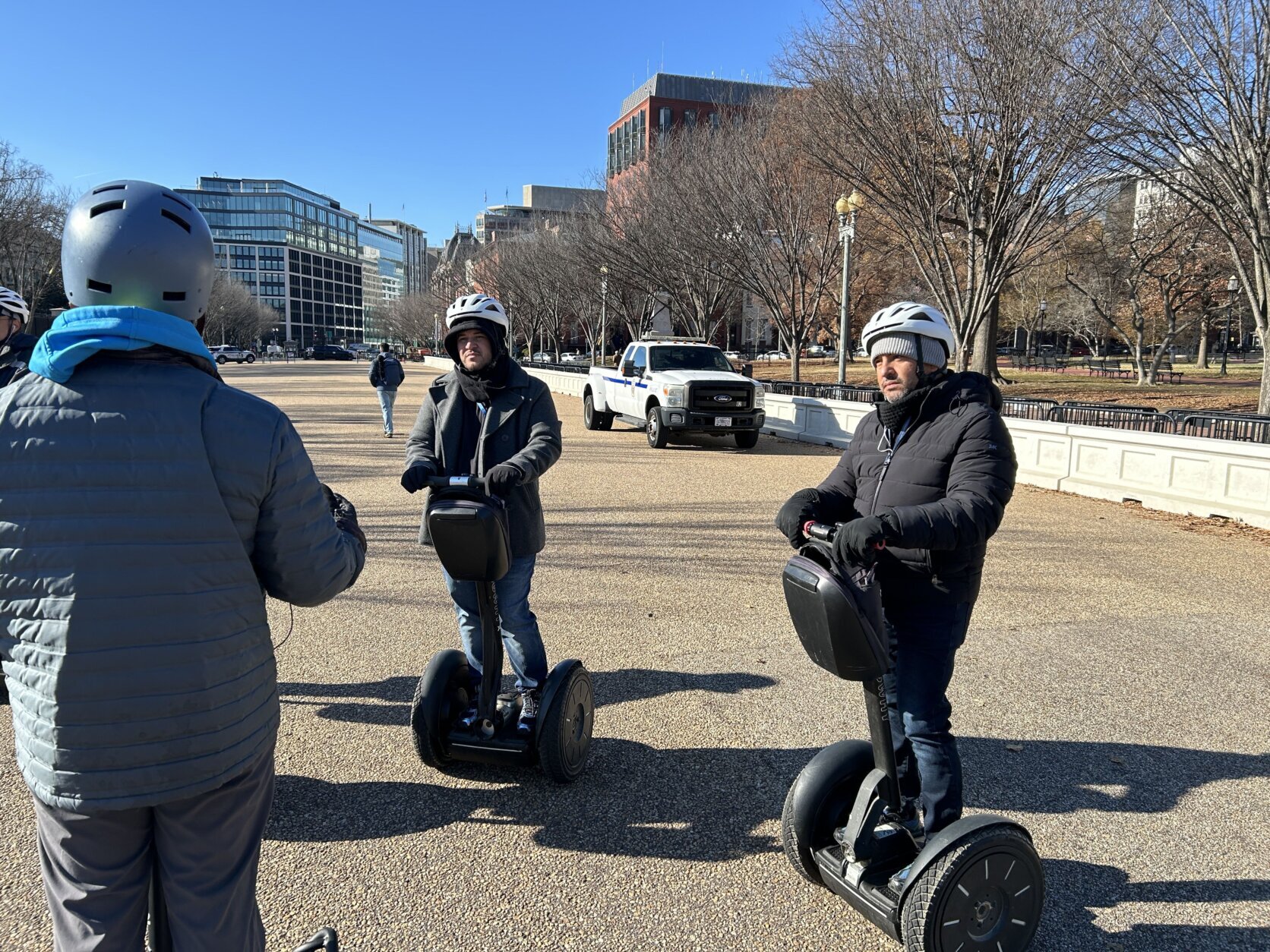 segway tour guide shares stories with guests