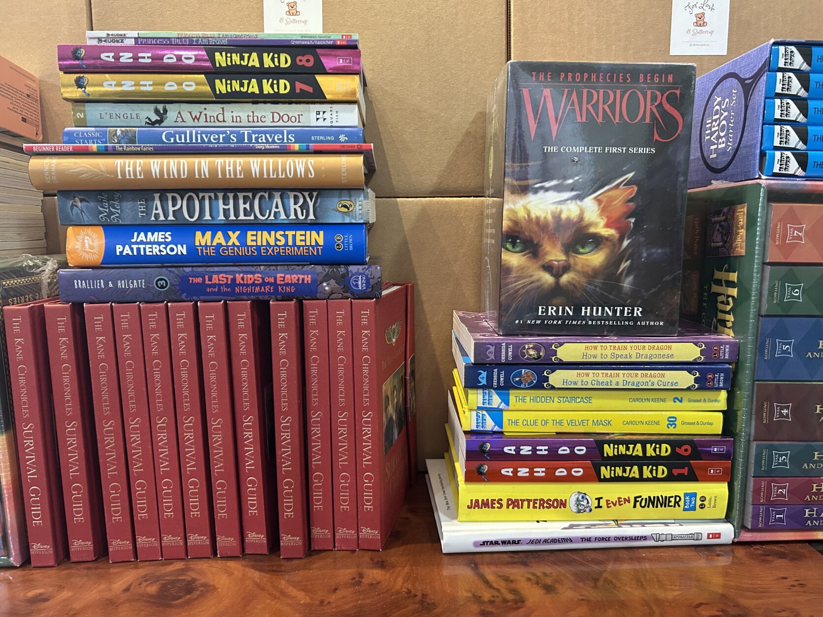 Books stacked neatly at For Love & Buttercup