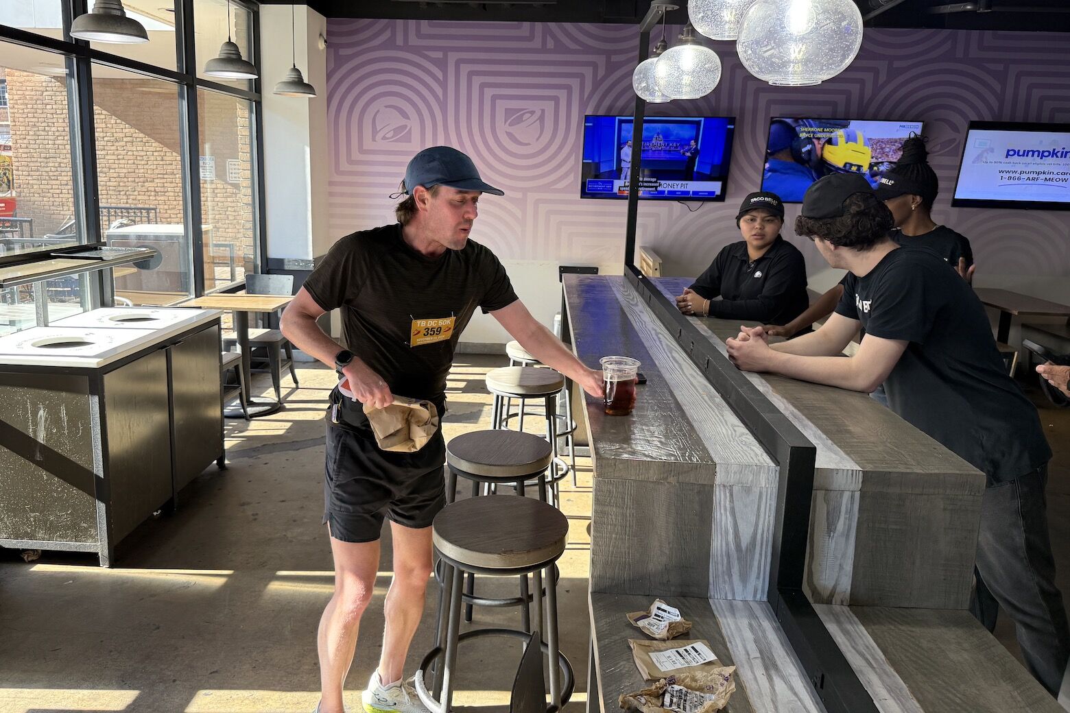 Runner picking up food and drinks