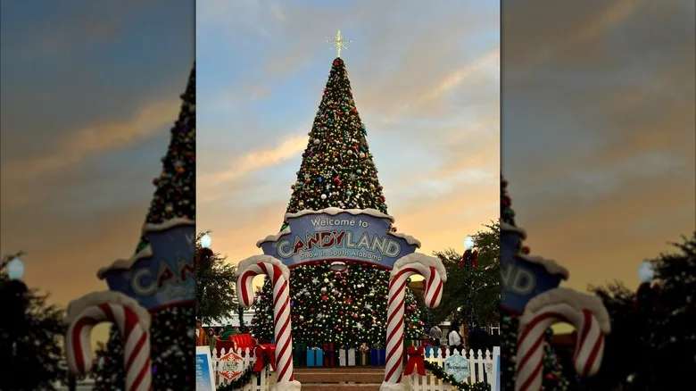 Christmas tree and candy-cane entrance welcome visitors to Christmas in Candyland in Andalusia, Alabama