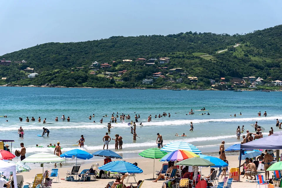 Alex Rodrigo Brondani/Getty Images Garopaba Beach, Brazil on a sunny day