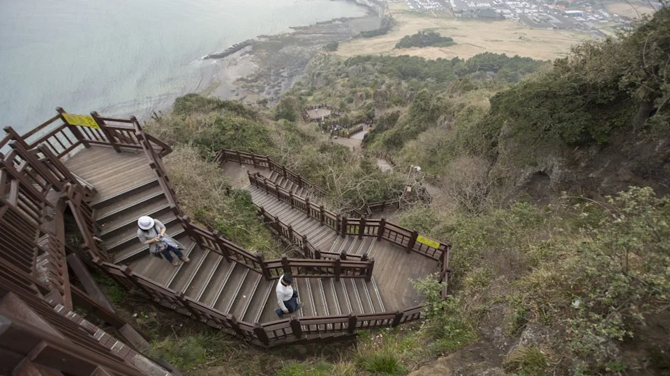 The view from Seongsan Ilchulbong, also called 'Sunrise Peak', is an archetypal tuff cone formed by hydrovolcanic eruptions.