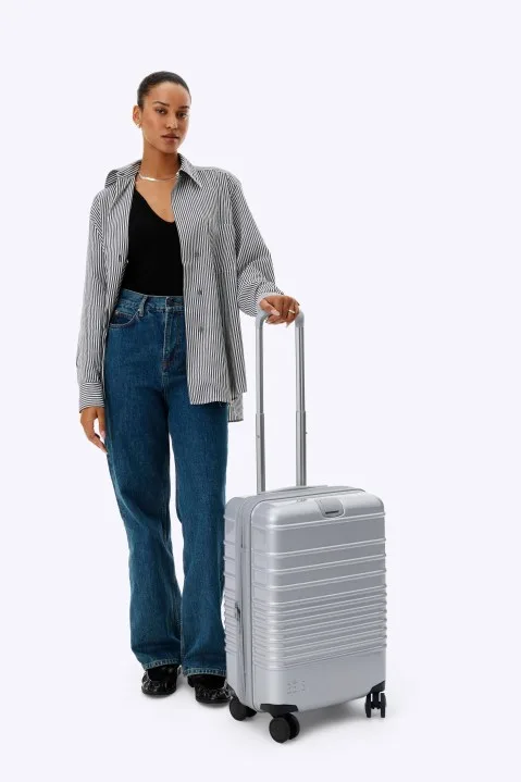 The Luggage Cover in carry-on (Chipotle x BÉIS)