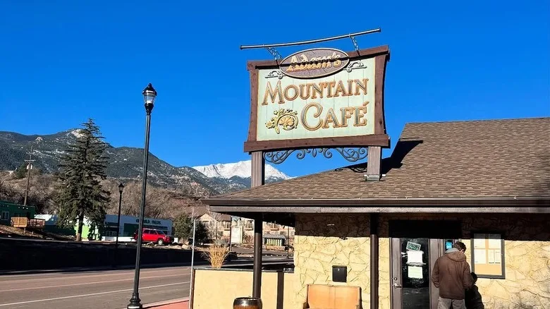 Adam's Mountain Cafe with mountain backdrop