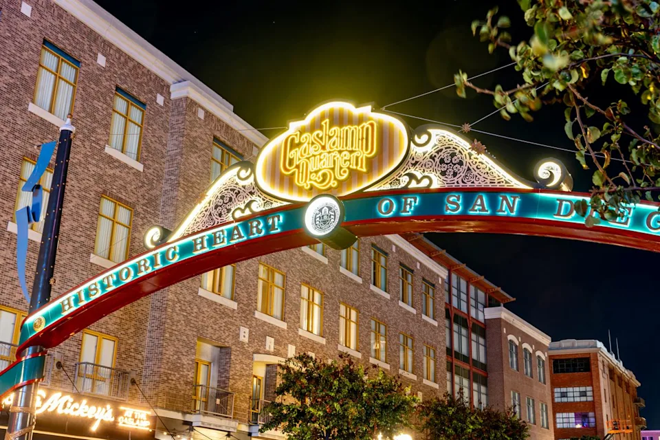 ReDunnLev/Getty Images A neon sign for San Diego's Gaslamp Quarter lit up at night.