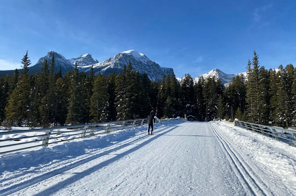 Evie Carrick/Travel + Leisure Cross country skiing in Banff National Park.