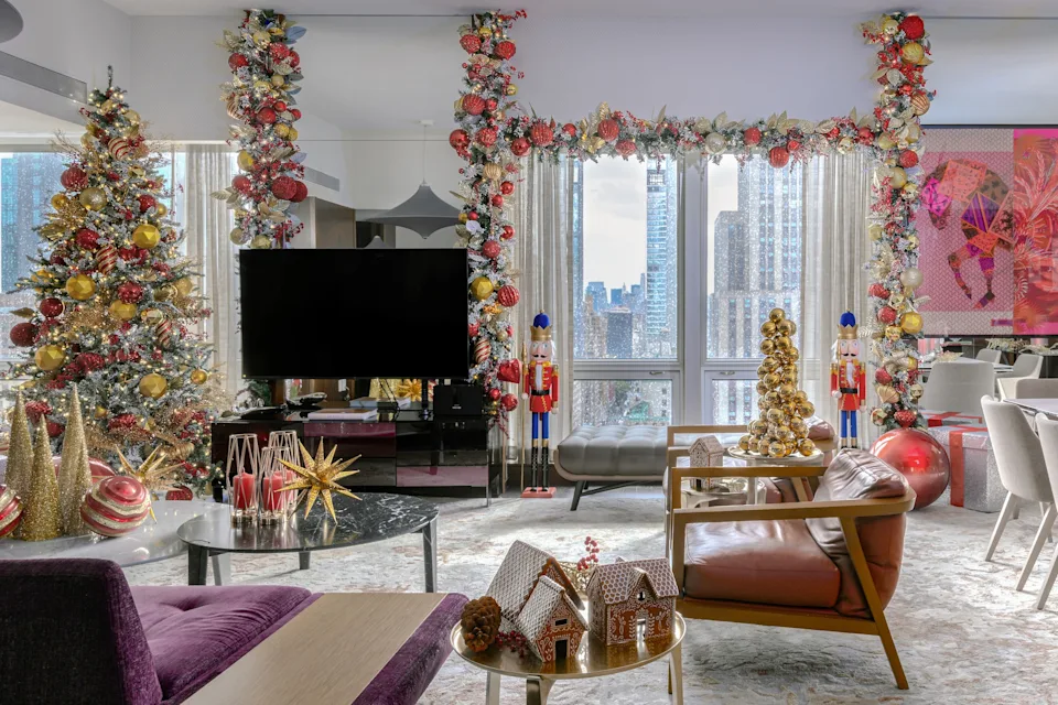 The Langham New York lobby decorated for the holidays with lights, garlands and festive seasonal décor.