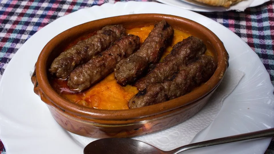 Grilled meat is a staple of meals in North Macedonia. Geography and history have helped the country retain local culinary delicacies that vary widely depending on the location. - CC151/Alamy Stock Photo