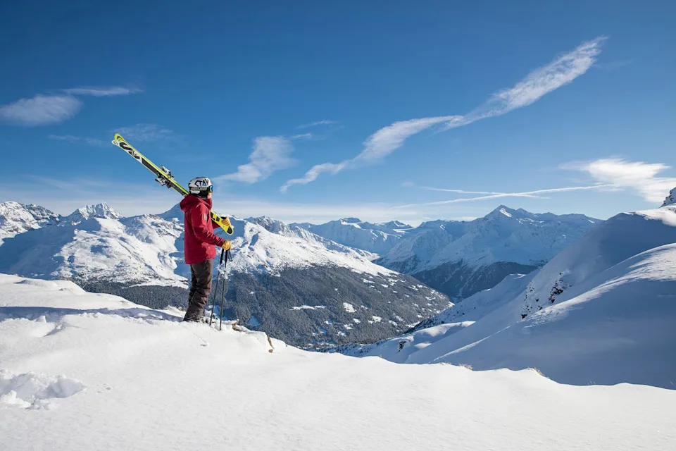 Bormio Tourism A skier on top of a mountain.