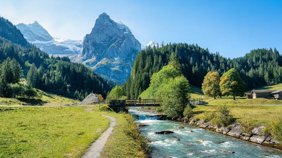 Beautiful view of Rosenlaui with wellhorn swiss alps and Reichenbach river in summer on sunny day at Canton of Bern, Switzerland