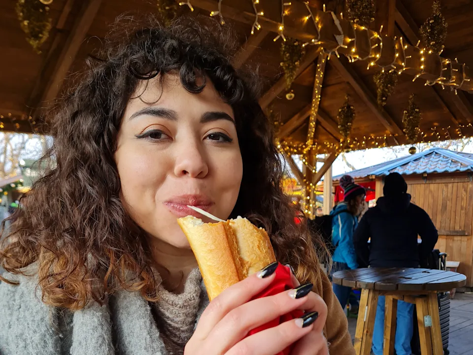 The author eating a Chäsbängel.