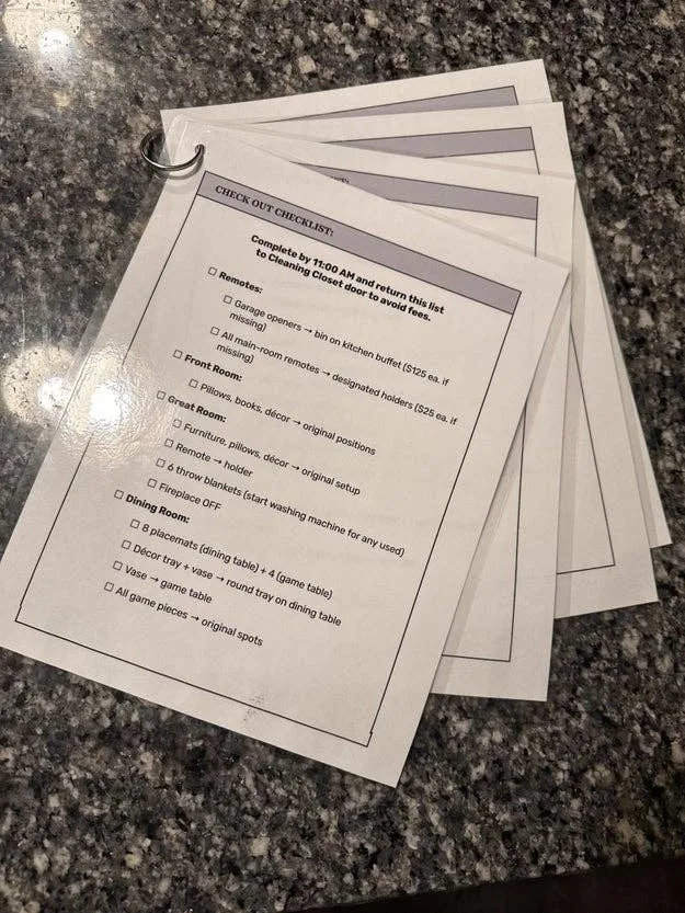 Checkout checklist on a keyring outlines tasks like removing trash, tidying rooms, and organizing items, to be completed by 11:00 AM for house cleaning