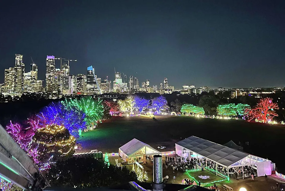 The Austin downtown skyline can be seen from the ferris wheel at Trail of Lights Wednesday, Dec. 11, 2024, at Zilker Park in Austin. Trail of Lights celebrated 60 years. (Briana Sanchez/American-Statesman)