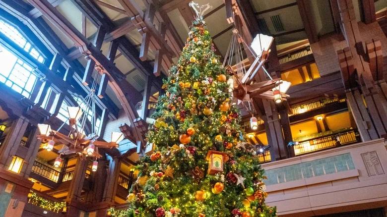 A Christmas tree in a hotel's lobby