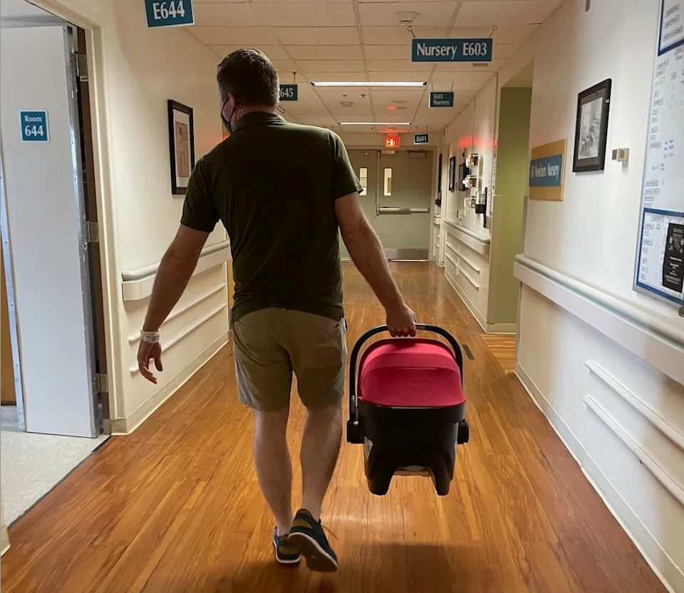 Leaving hospital with our son.