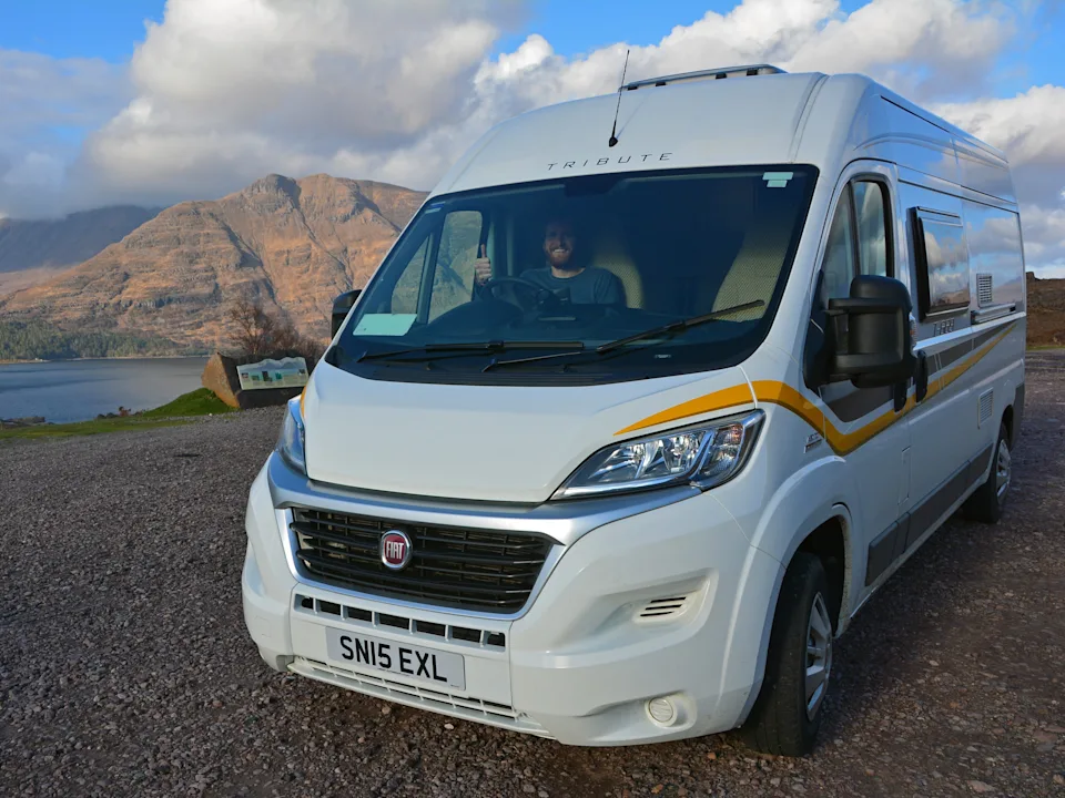 Man in a campervan in Scotland.