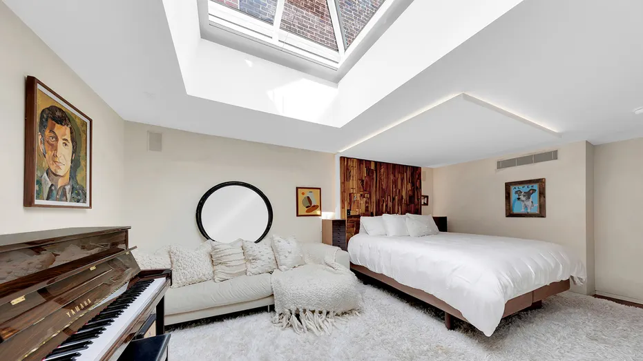 The primary bedroom features a skylight.