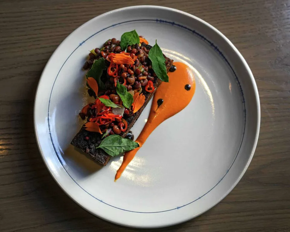 Plating elegance at Olamaie matches the sophisticated mood of the modern Southern restaurant. (AARON E. MARTINEZ)