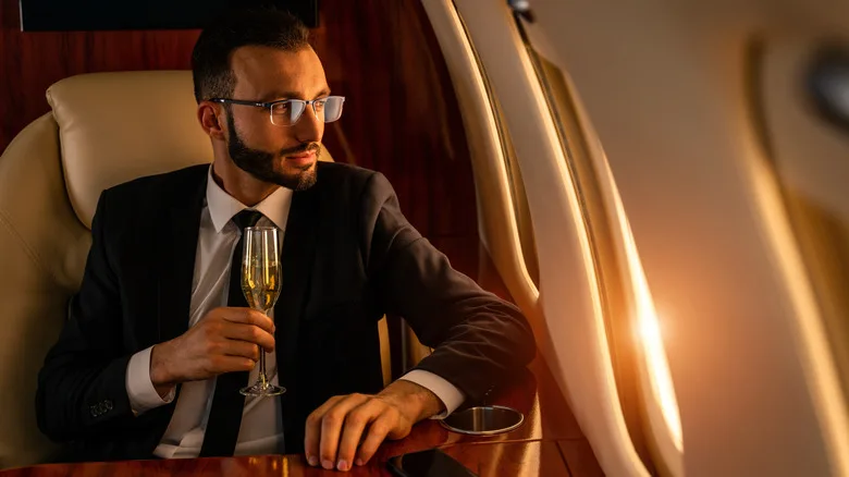 man sitting in business class