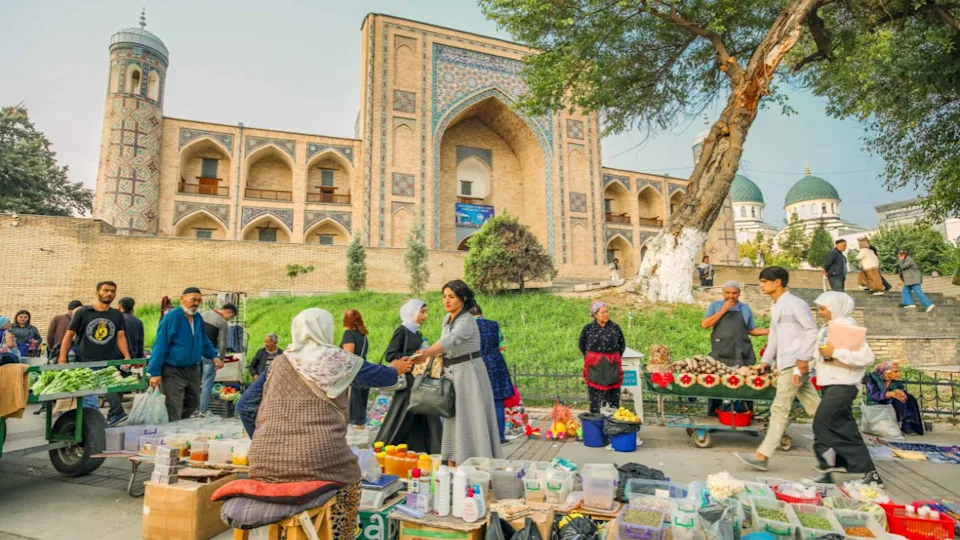Tashkent, Uzbekistan - October 10, 2023: traditional Uzbek Bazaar located in center of the old town in Tashkent, people selling their product on treet