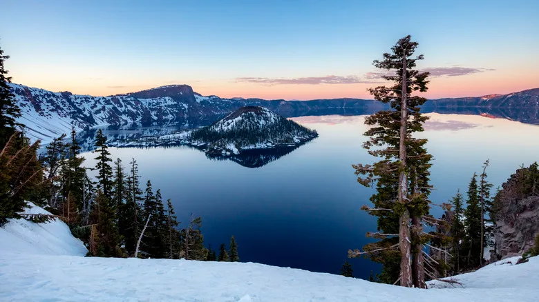 An aerial view of Crater Lake in the winter