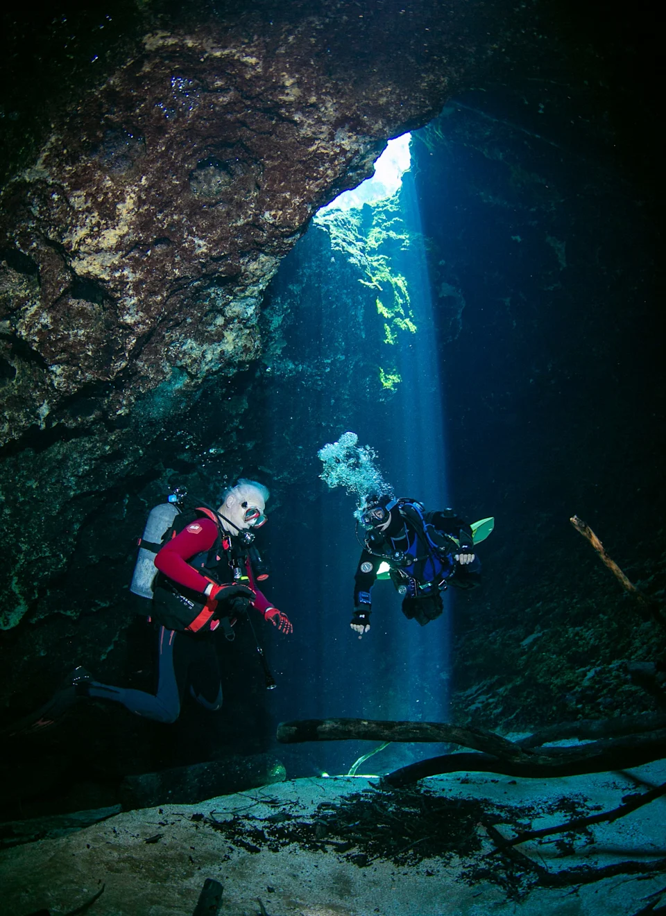 Taylor Schott, right, and Joe Wallace explore the cavern at Blue Hole, also known as Jug Hole, at Ichetucknee Springs State Park on Oct. 22 in Fort White. Blue Hole offers a lovely swim and exciting dive for those with the right training.