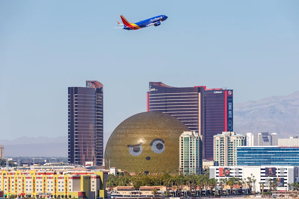 Las Vegas, United States - October 14, 2024: Southwest Airlines Boeing 737-8 MAX airplane and The Sphere at Las Vegas Airport in the United States.
