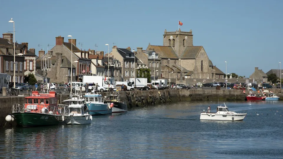 Barfleur a small French port in the Normandy region - August 2016 - The coastal commune of Barfleur in Normandy northwest France. Boats berthed in the small harbor