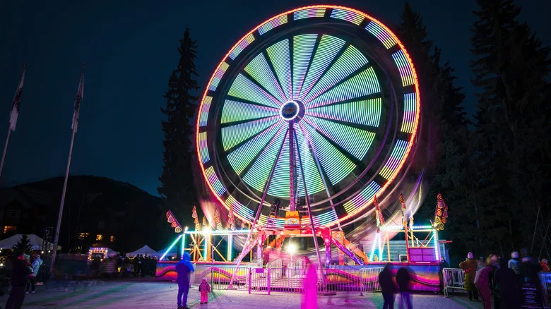 A ferris wheel at dusk at the Whistler Winter Festival, Whistler, British Columbia