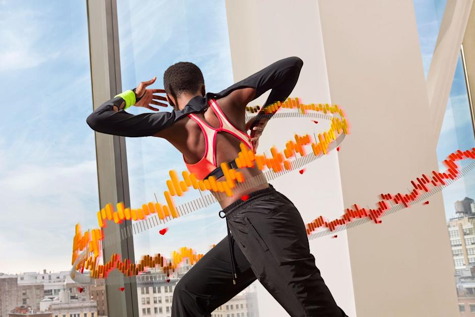 a person performing an energetic dance move with visual soundwave effects