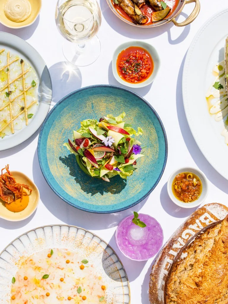 Salad, carpaccio, and drinks at this South River Drive eatery. Lea Gil/Courtesy of Bagatelle