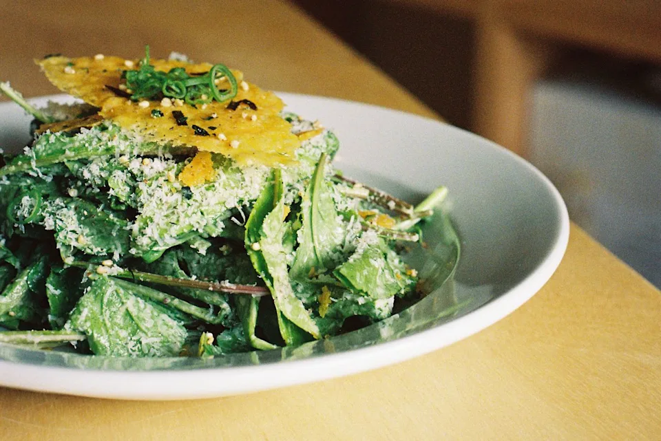 Nat Nat The caesar salad at Nat Nat, topped with furikake and a parmesan crisp.