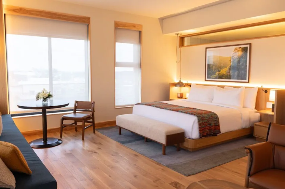 Angela Treimer/Treimer Creative Interior of a guest room.