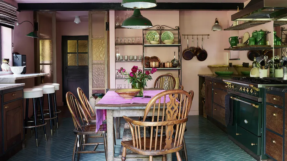 The kitchen also includes an informal dining area.