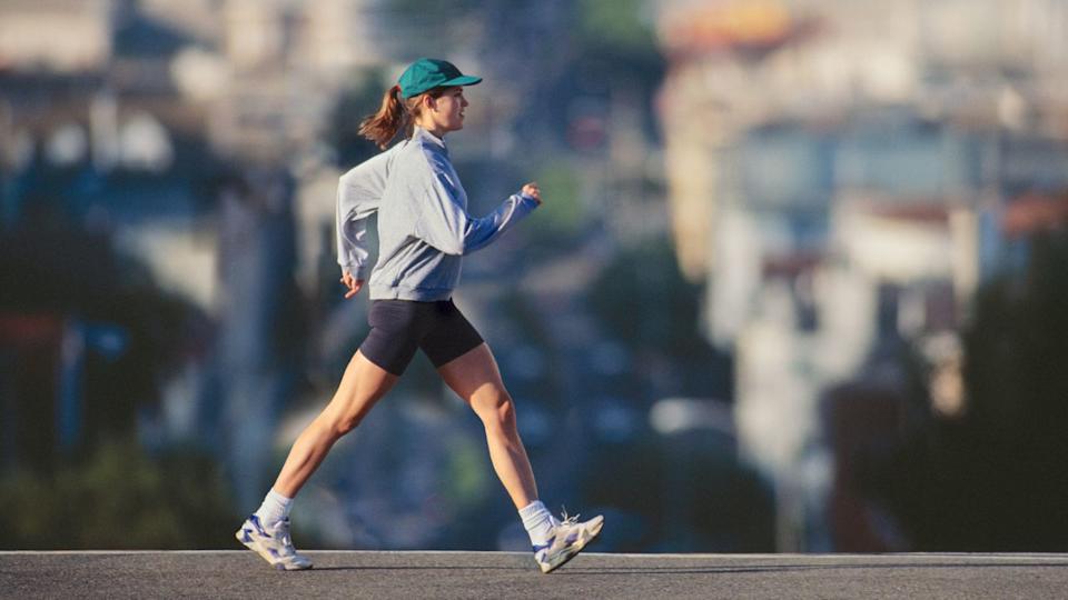  A woman doing power walking . 