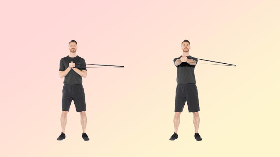 a photo of a man doing a pallof press