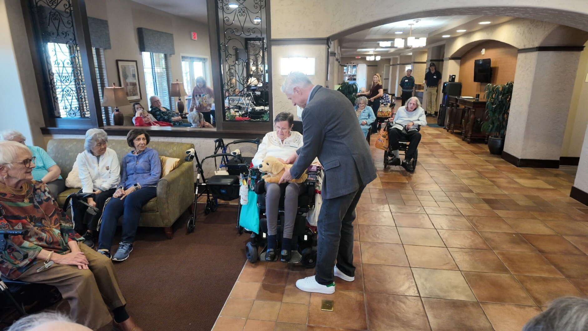 Tombot took Jennie into the real world for hands-on demonstrations at senior living communities.