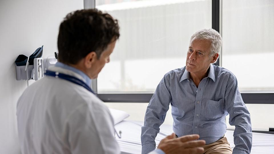 Doctor talking to a patient in a consultation at the office