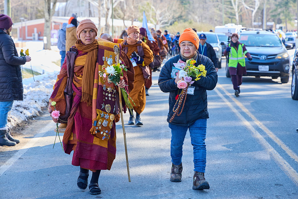 <p>Led by Bhikkhu Pannakara (L), Buddhist monks participate in a “Walk for Peace” in Glen Allen, Virginia, on Feb. 3, 2026. (Photo by Aaron Mathes / AFP via Getty Images)</p>

