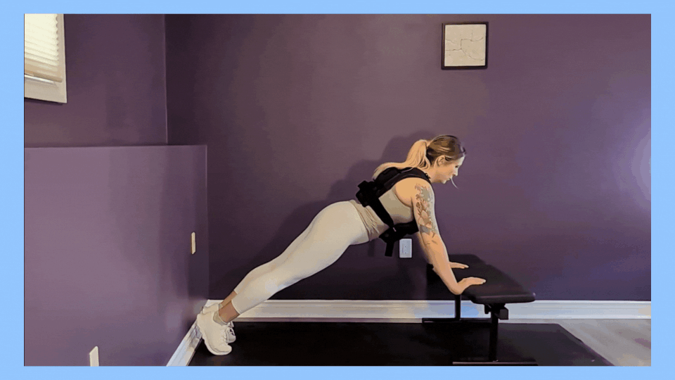 There's a reason to start a weighted vest pushup on an incline — it's much more challenging than a traditional pushup. 