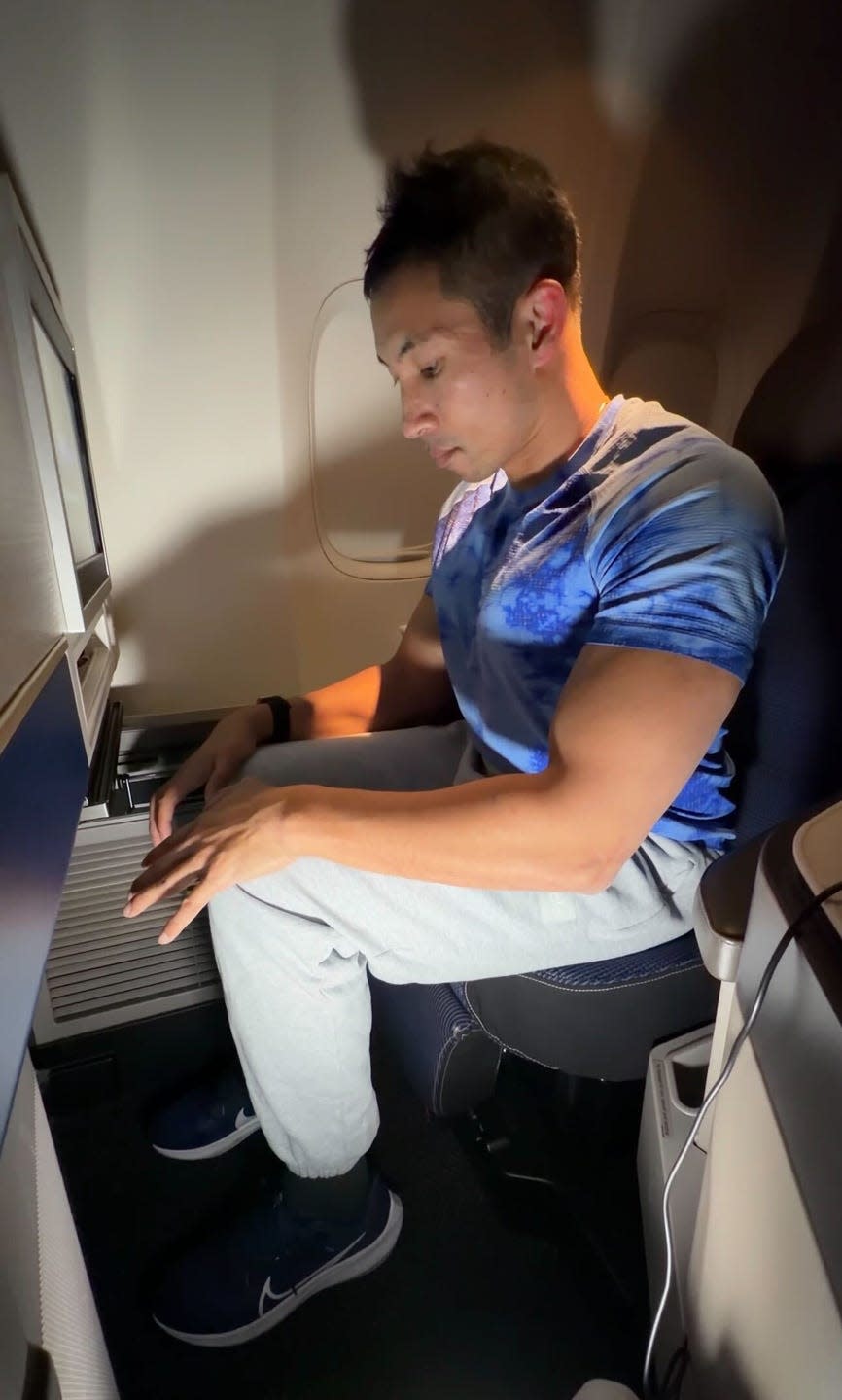 passenger sitting in an airplane seat