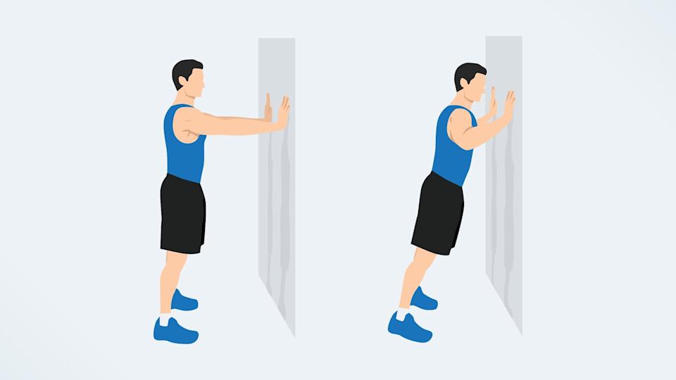a man doing push ups on a wall