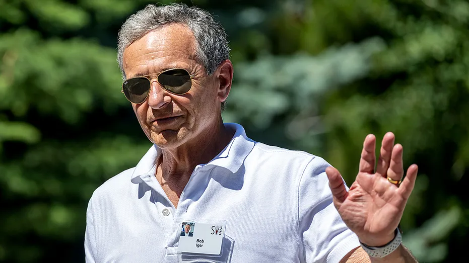 Disney CEO Bob Iger waves