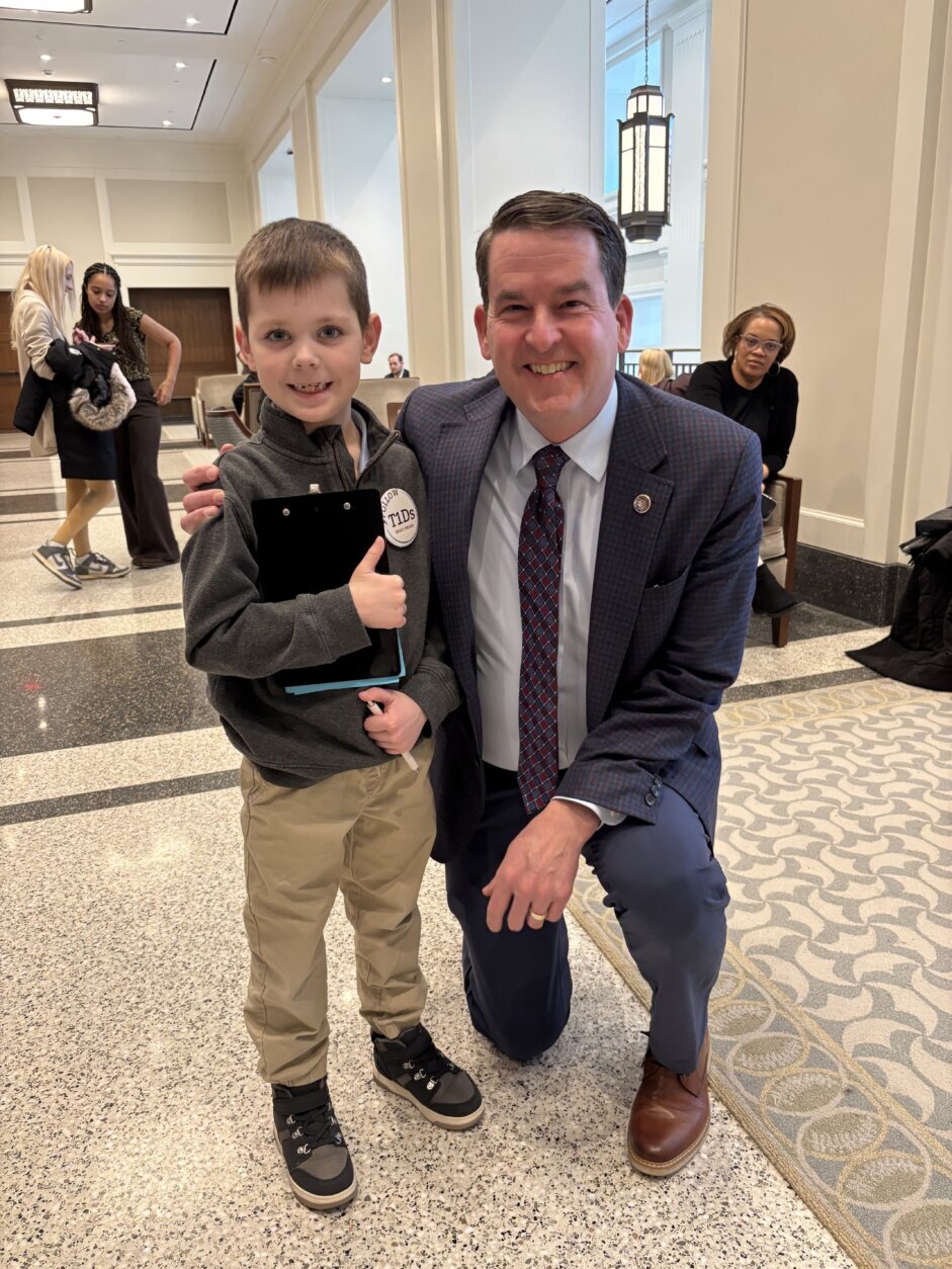 Ruston stands alongside Virginia Sen. Jeremy McPike, who sponsored the bill in the upper chamber