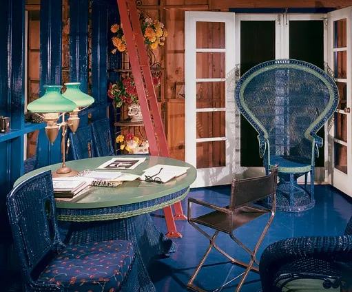 This image may contain Furniture Chair Housing Building Home Decor and Table